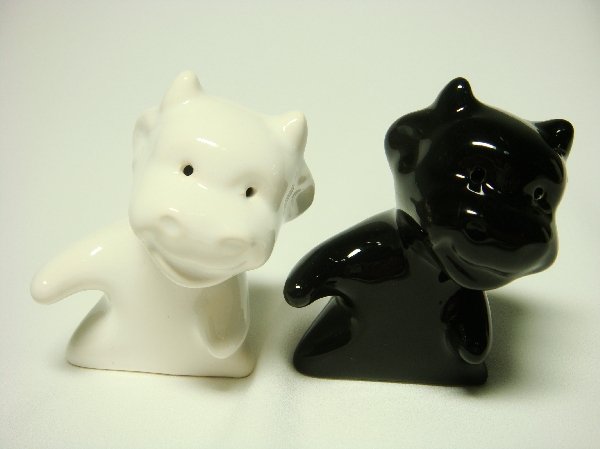 Ceramic Salt & Pepper Shakers Black & White Cow Hug