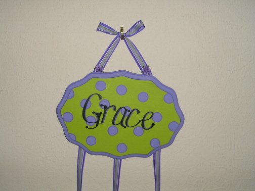 Green with purple polka dots.