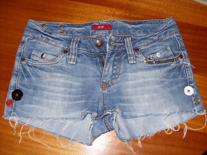 Denim shorts with buttons and sequins
