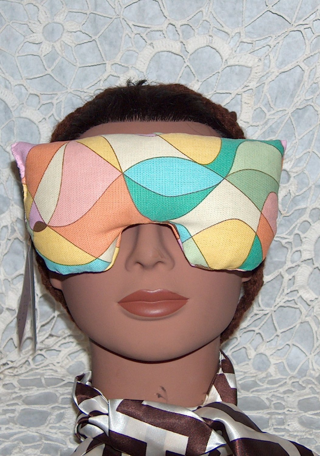 multi colored eye mask-pillow with pale pink strap