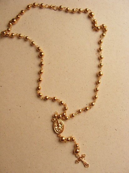 Goldtone extra long rosary necklace