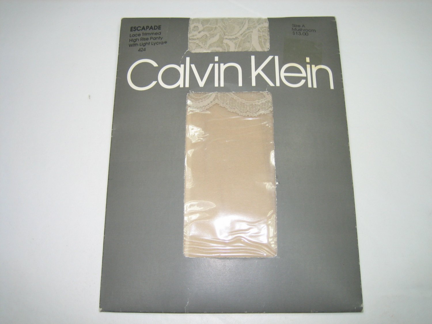 Calvin Klein Escapade lace trim high rise pantyhose mushroom size A