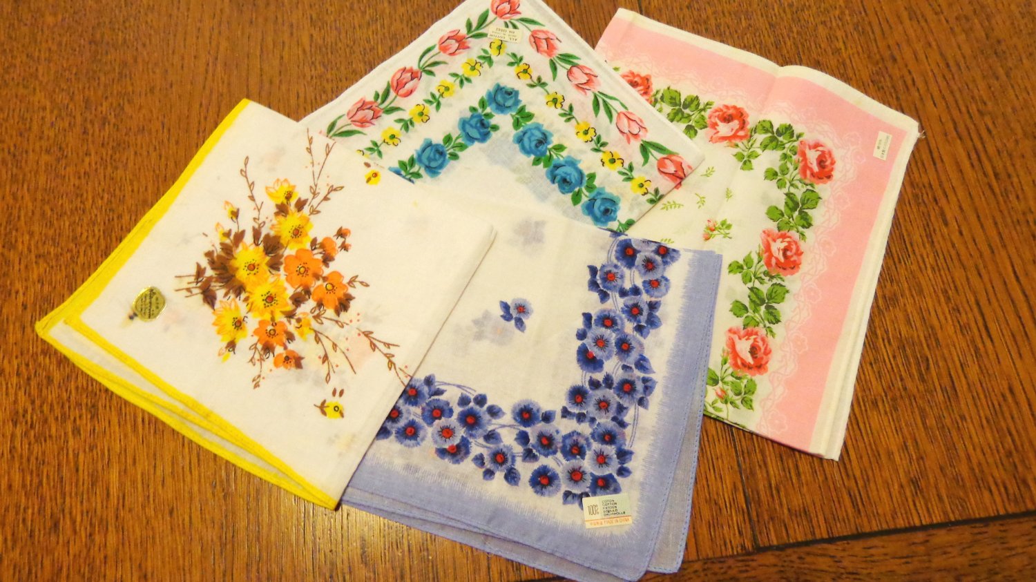 Lot of 11 vintage hankies floral printed cotton most have factory stickers attached ll3498