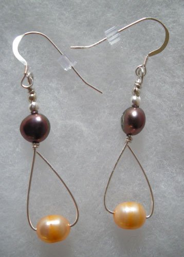 Peach and Gray on a wire