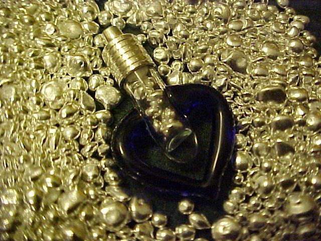PURE SILVER BULLION ENCASED IN BLOWN GLASS BLUE HEART
