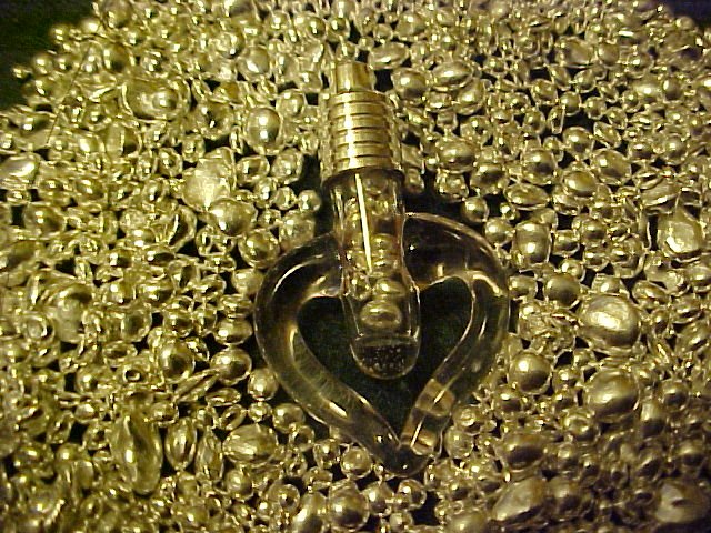 PURE SILVER BULLION ENCASED IN BLOWN GLASS CLEAR HEART