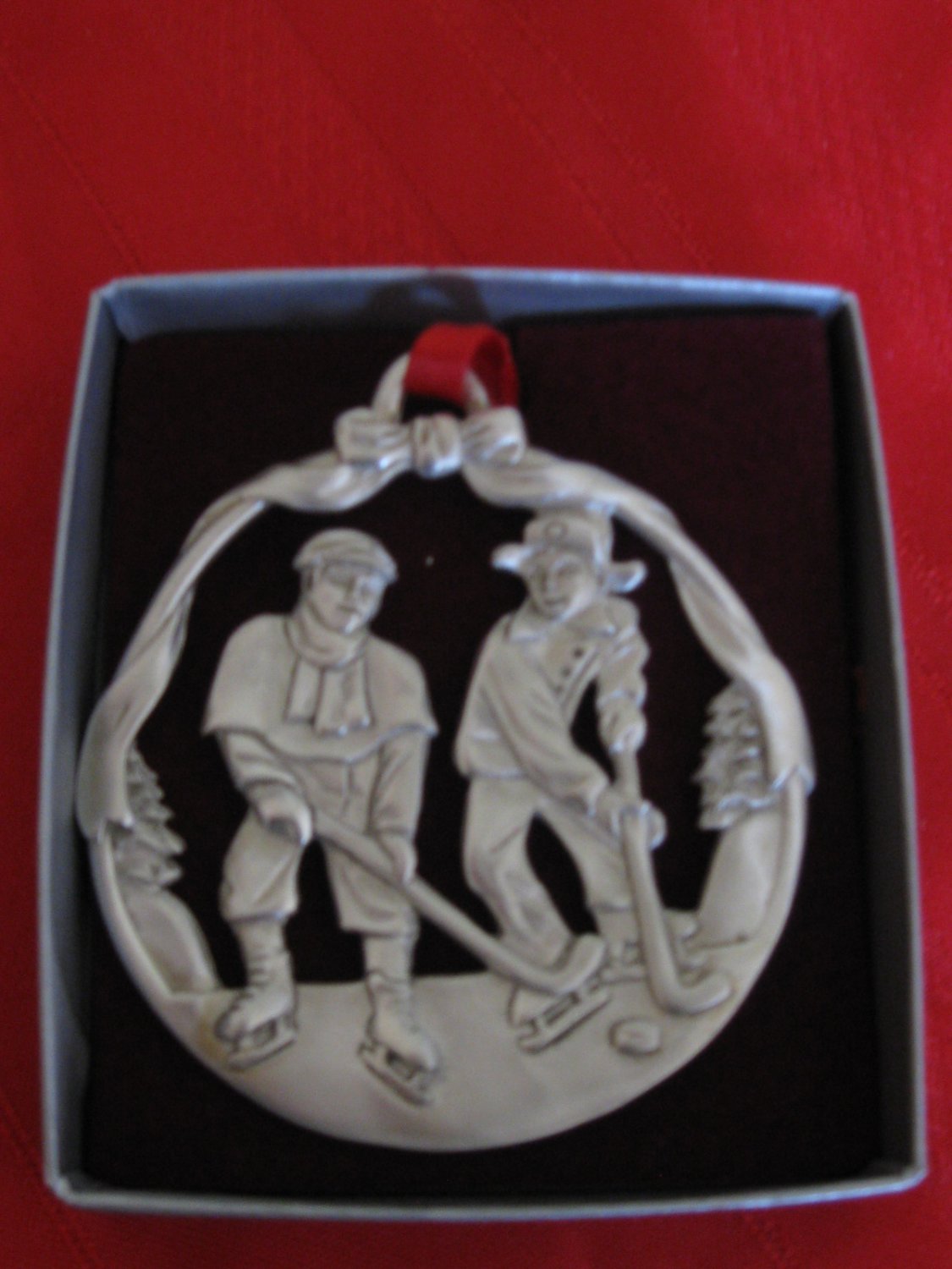 Very Nice Pewter Ornament With Children Playing Hockey by Oceanart 1998