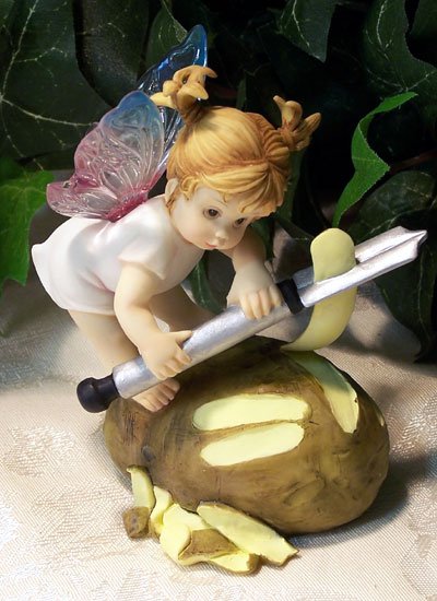Kitchen Fairy Peeling Potato
