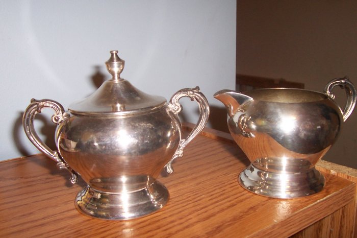 Silver creamer and sugar bowl