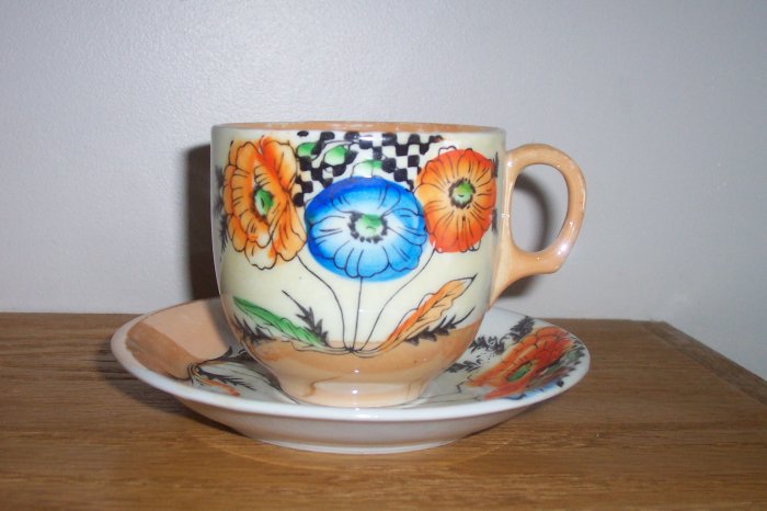 Lustre Tea Cup & Saucer