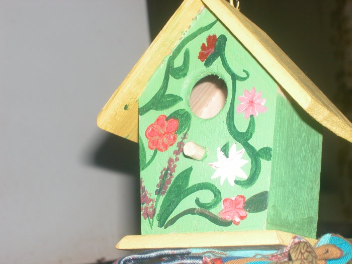 green/yellow flora birdhouse