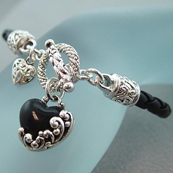 SILVER ACCENTED BRAIDED BAND with BLACK ONYX HEART DANGLE
