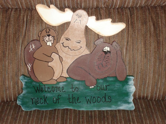 "Welcome To Our Neck Of The Woods" sign