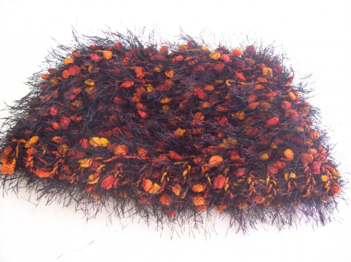 Hand-knitted ladies hat, black with orange