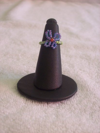 Butterfly ring, purple on green