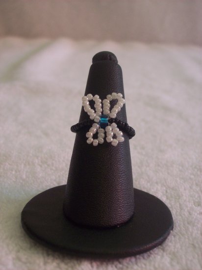 Butterfly ring, white on black