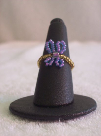 Butterfly ring, purple on gold
