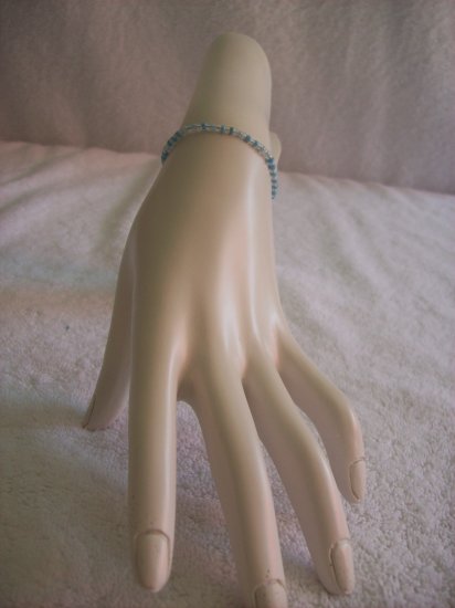 Beaded bracelet, clear and light blue