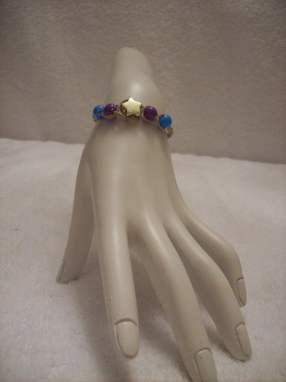 Gold star with purple and blue beads (4) on tan braid