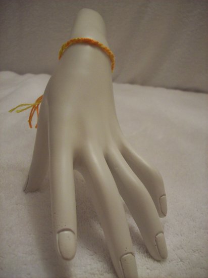 Yellow and orange braided wrap