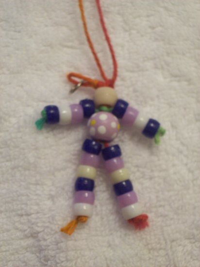 Flower bead (purple), tan, dark blue, purple, white