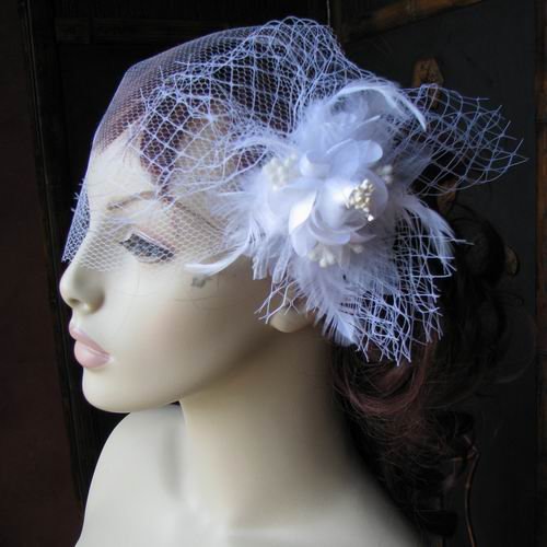 White feather fascinator