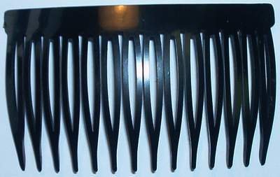 Black plastic sidecomb