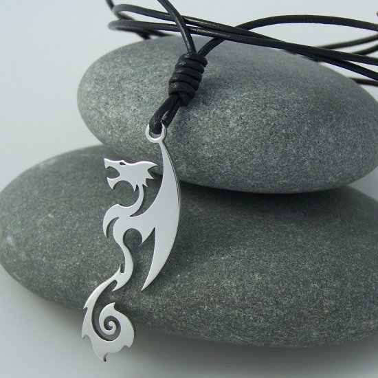 Tribal dragon, stainless steel pendant on natural leather cord. A surfer style necklace