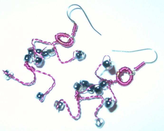 Pink adjustable figure earrings