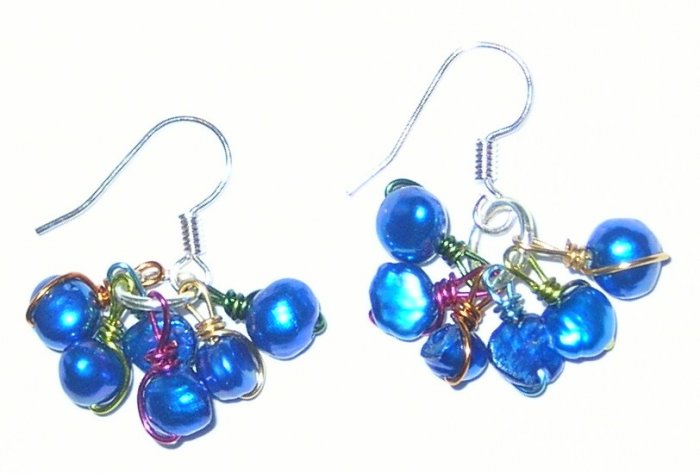 Wire wrapped shocking blue pearl earrings