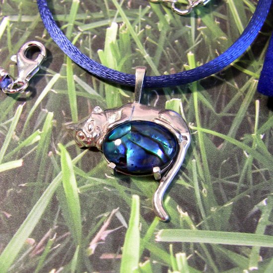 Cobalt Sleeping Cat: Sterling silver with blue dyed paua shell
