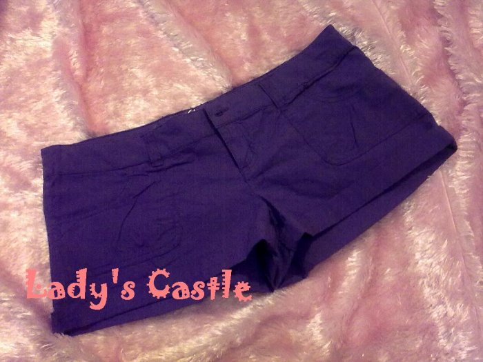 The purple shorts