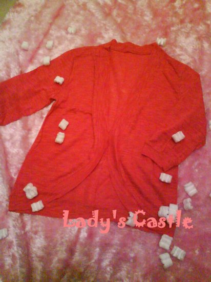 The orange cardigan