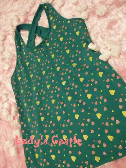 The green dotted vest