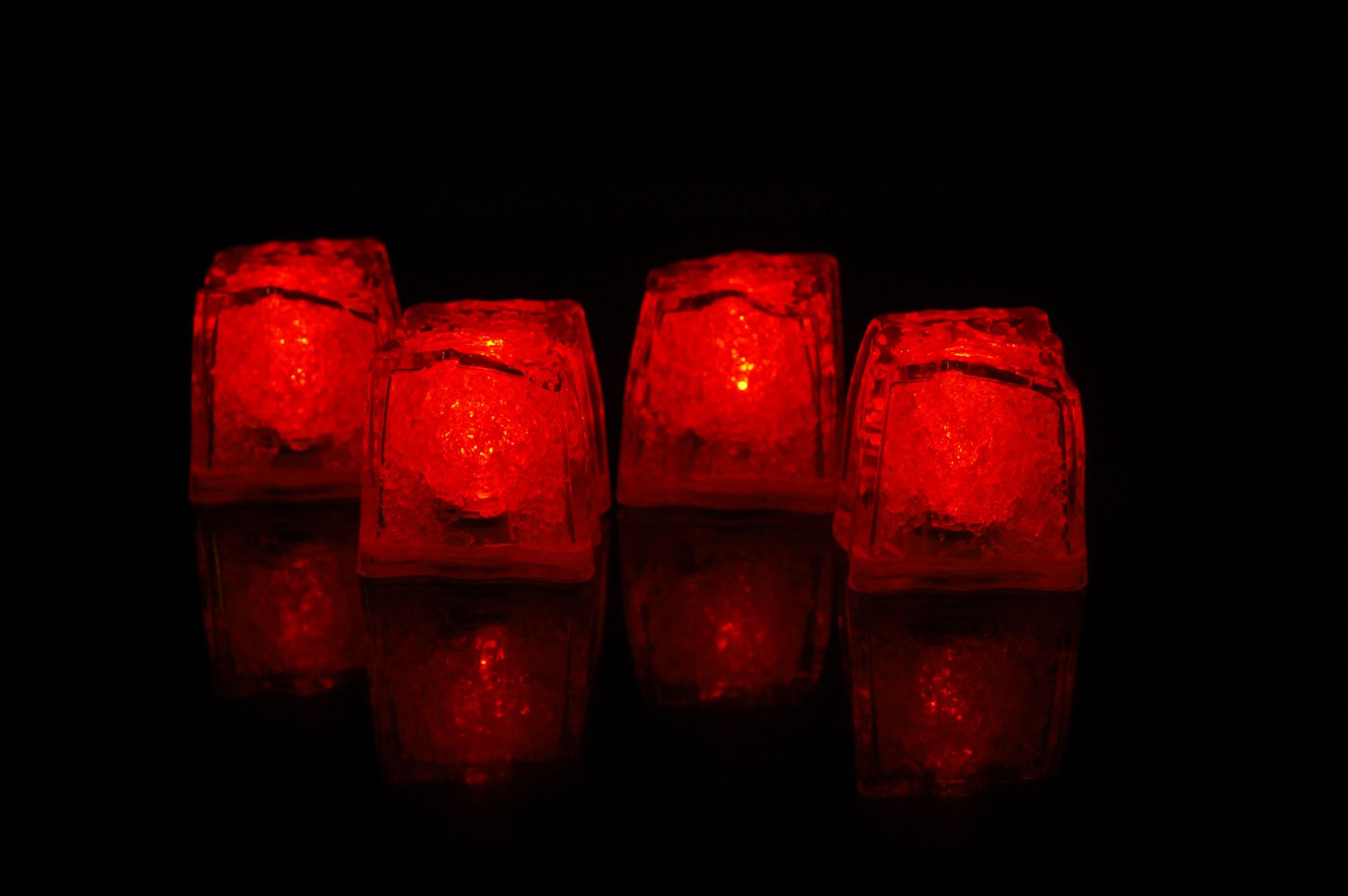 Set of 4 Litecubes Brand Jewel Color Tinted Ruby Red Light up LED Ice Cubes