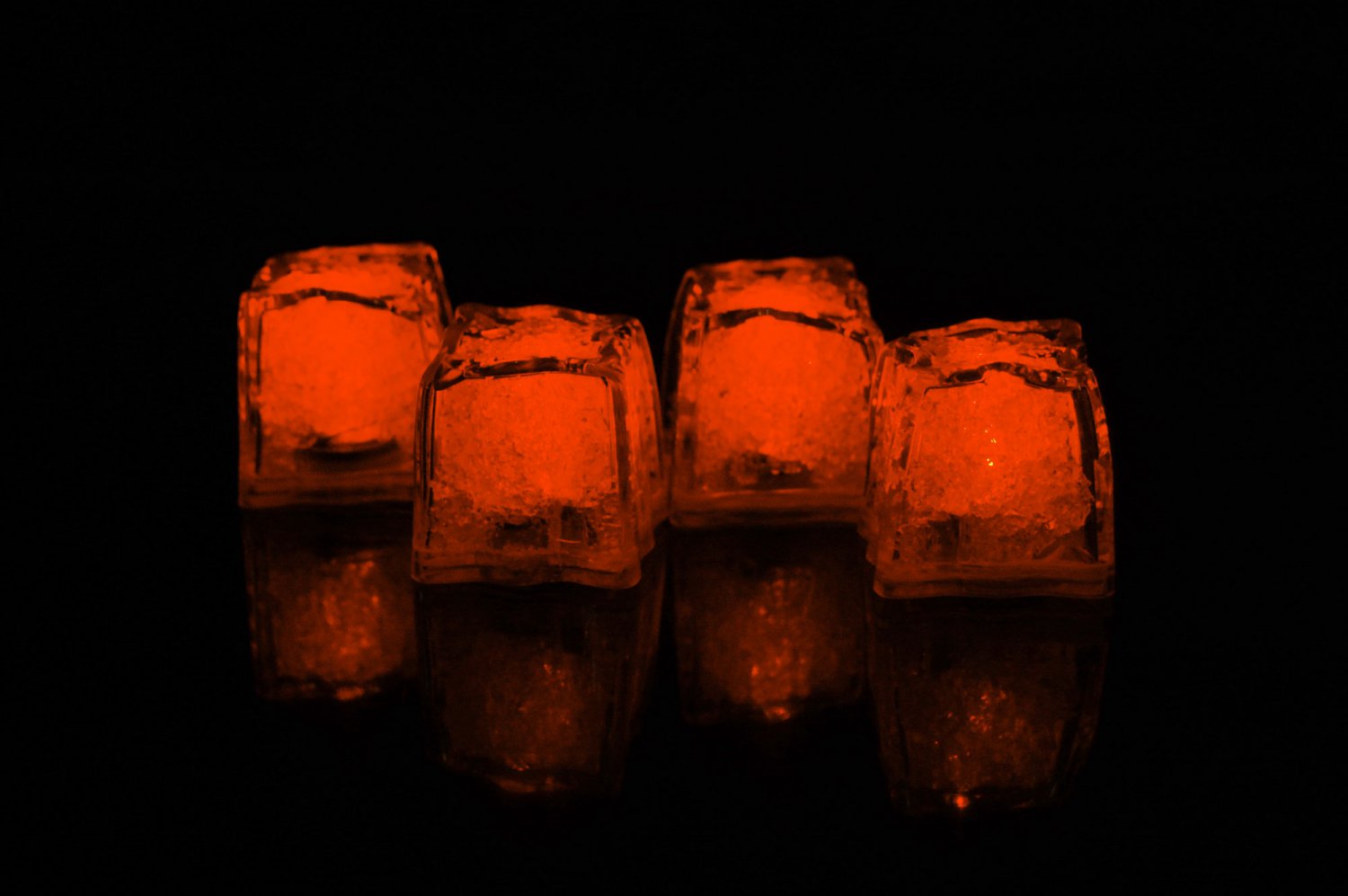 Set of 4 Litecubes Brand Jewel Color Tinted Amber Orange Light up LED Ice Cubes