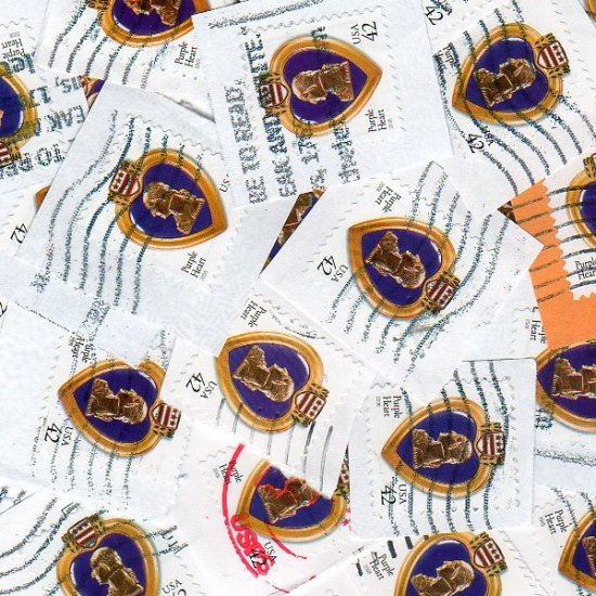 100 USA Used Purple Heart Postage Stamps on paper bundle bundleware