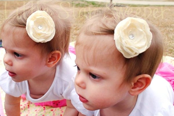 Two Ivory Singed Flowers
