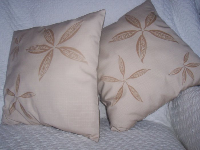 pair taupe cushions with native design by Gina