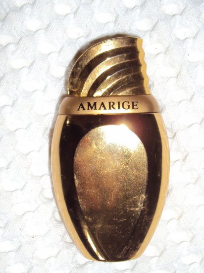 Gold plated refillable Amarige bottle from Givenchy