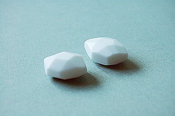 White faceted glass beads (per pair)