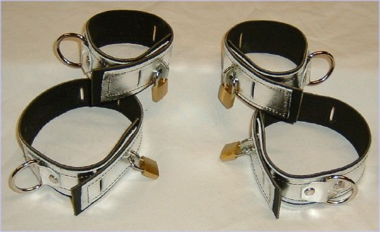 Set of FOUR Locking Silver Metallic Leather Cuffs