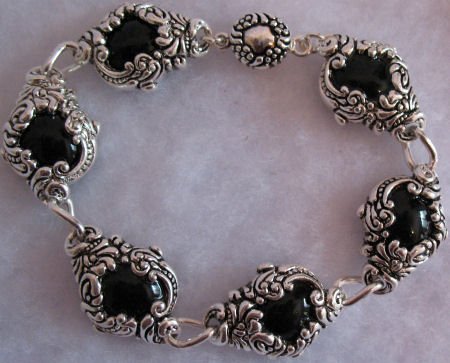 Bracelet with Black beads in ornate setting Jewelry CafeBug Women's Accessories