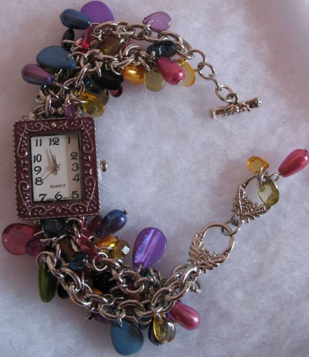 Multi colored beaded womens cha cha watch