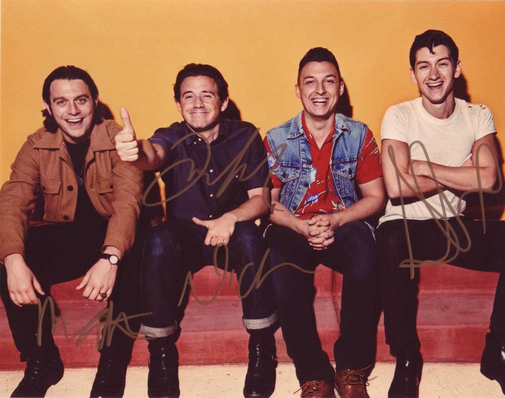 Arctic Monkeys in-person autographed band photo by all 4