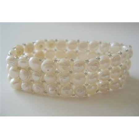 TB361 Three Stranded Cream Freshwater Pearls Stretchable Bracelet