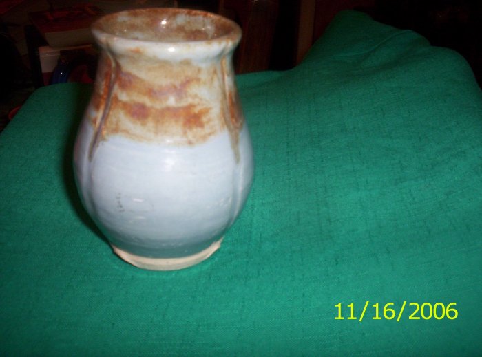 Blue glazed pottery vase with brown contrast