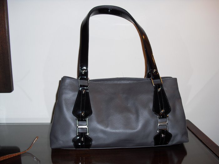 Gray leather with black patent leather details and buckles