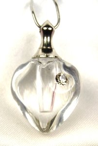 Heart shaped clear heart vial with rhinestone pendant