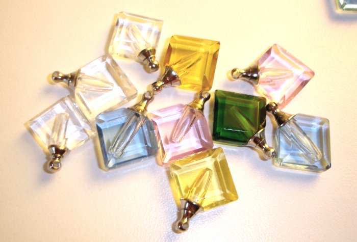 10 Assorted diamond shaped pendant vial charms
